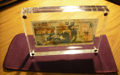 .gif of capital plastics holder with a Jack Nicklaus Royal Bank of Scotland Five Pound Note.